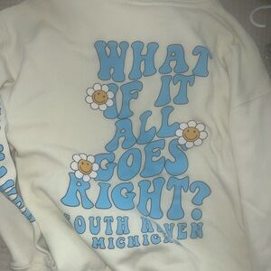 Cream Sweatshirt with Blue Graphic Text